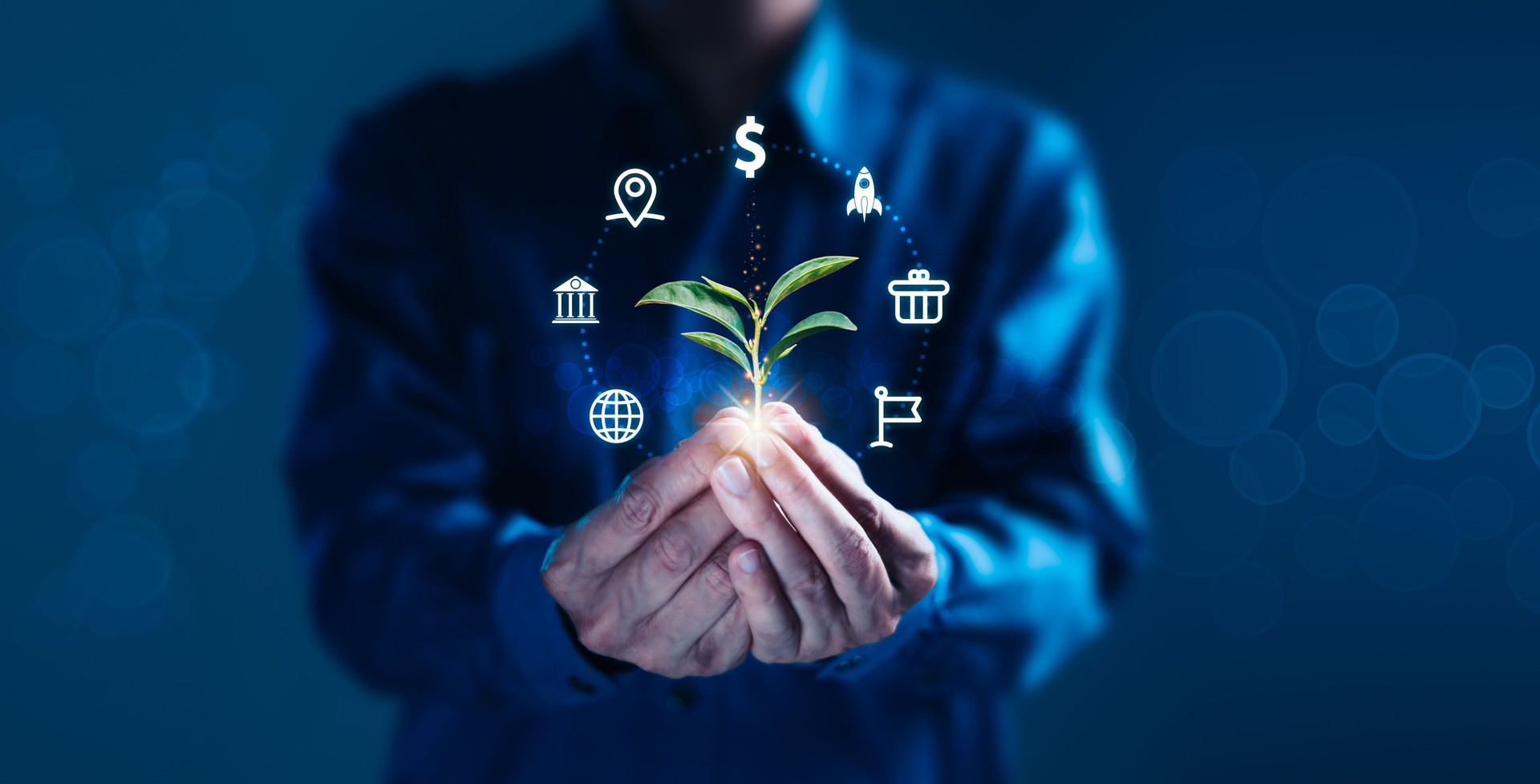 Businessman Holding Growing Plant Symbolizing Financial Success and Investment Strategy